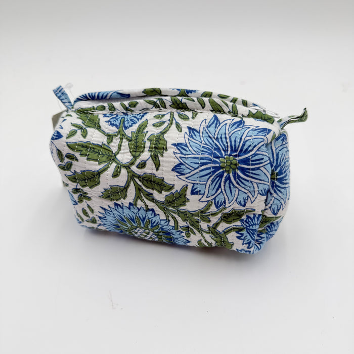Floral-patterned pouch with blue and green flowers on a white background