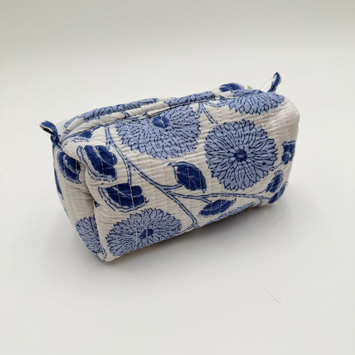 Fabric pouch with blue floral pattern on a white background