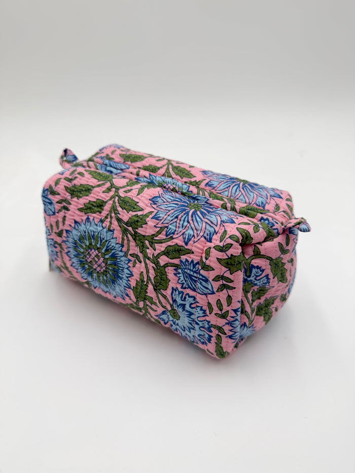 Floral-patterned pouch on a white background
