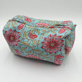 Floral patterned fabric pouch on a white background