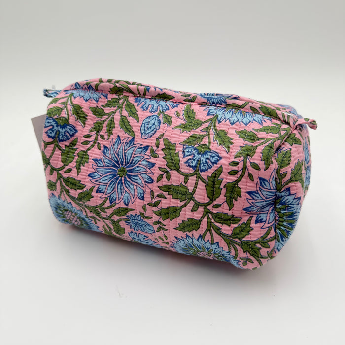 Floral-patterned pouch on a white background