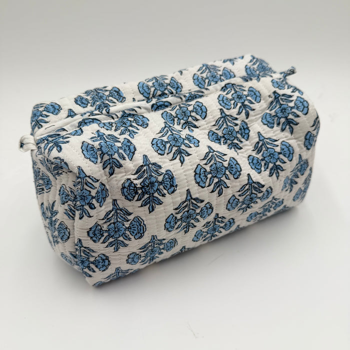 Fabric pouch with blue floral pattern on a white background