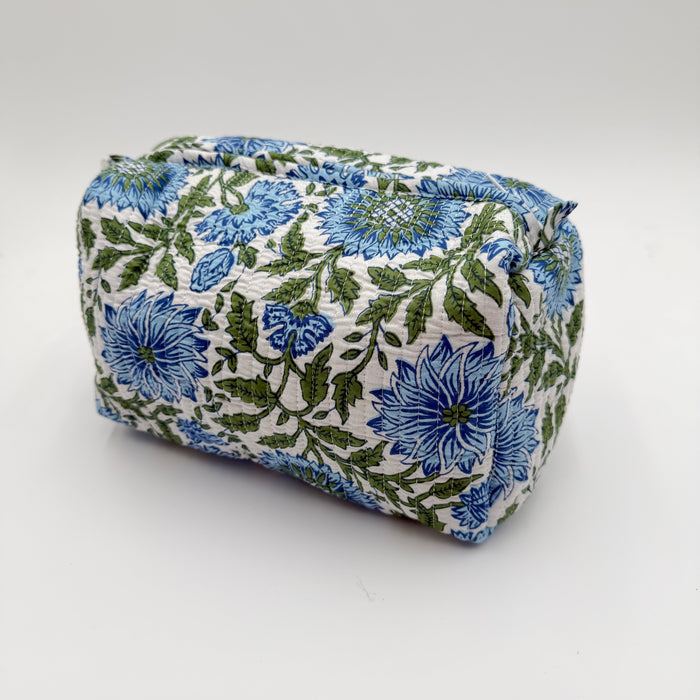 Fabric pouch with blue floral pattern on a white background
