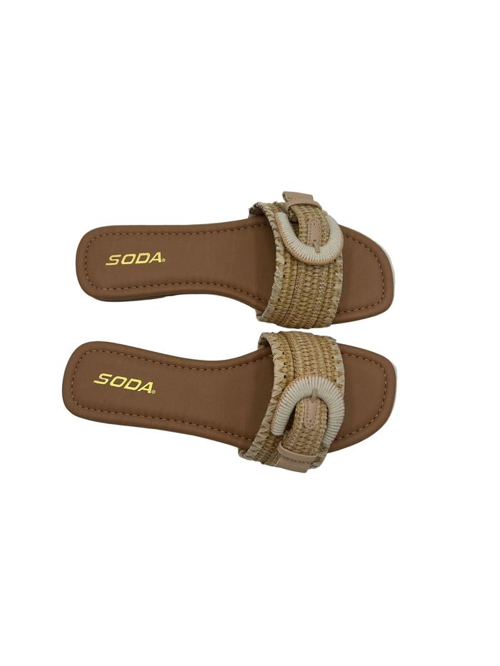 Pair of brown sandals with woven straps on a white background