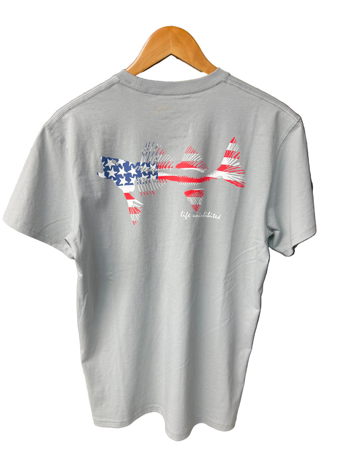 Gray t-shirt with a graphic design on a wooden background