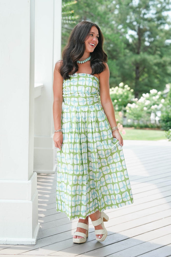 blue and green strapless dress with geometric pattern