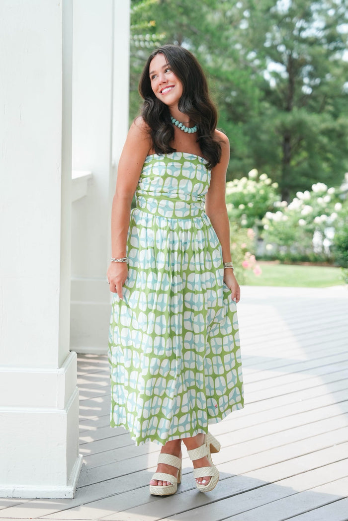 blue and green strapless dress with geometric pattern