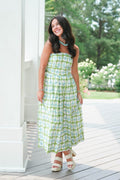 blue and green strapless dress with geometric pattern
