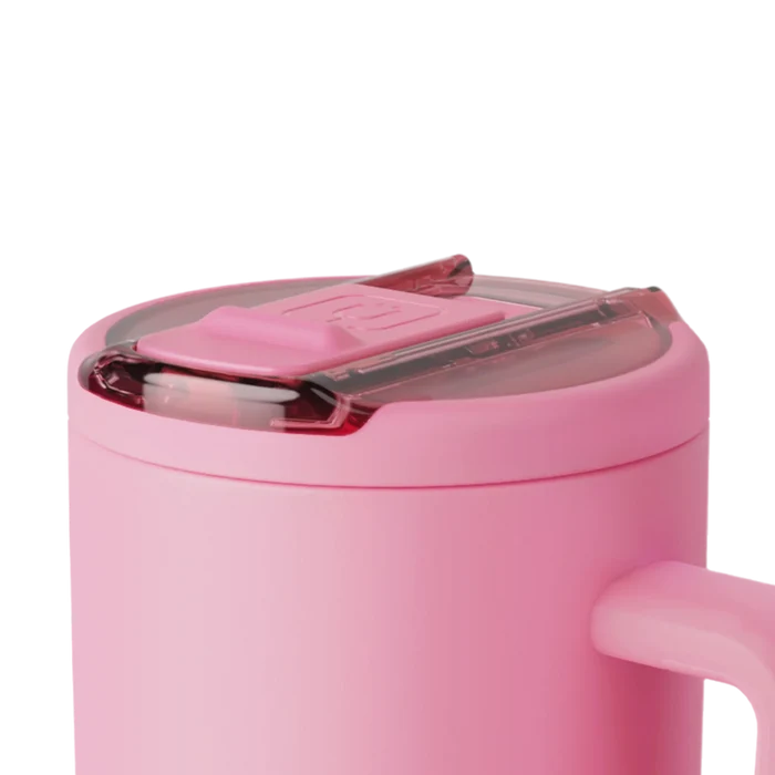 Pink mug with a clear lid on a white background