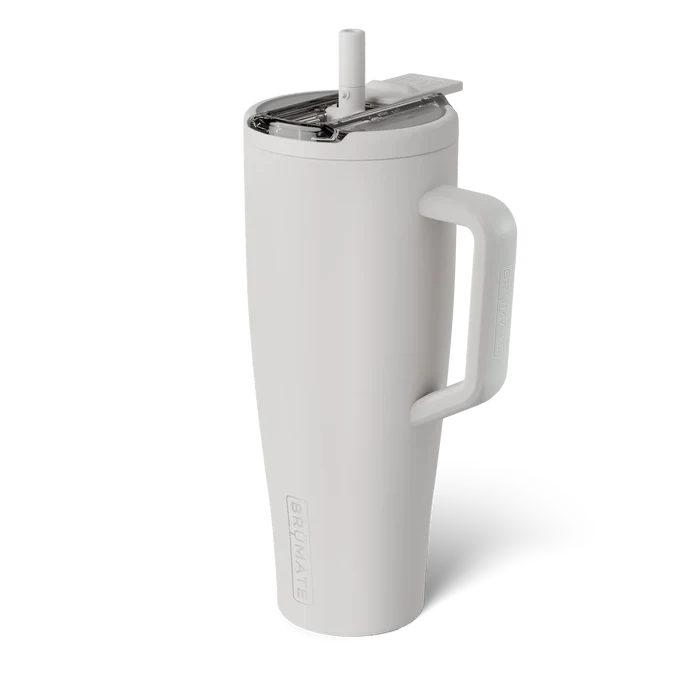 White insulated tumbler with handle and straw on a white background