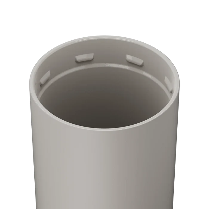 Gray cylindrical object with circular cutouts on a white background