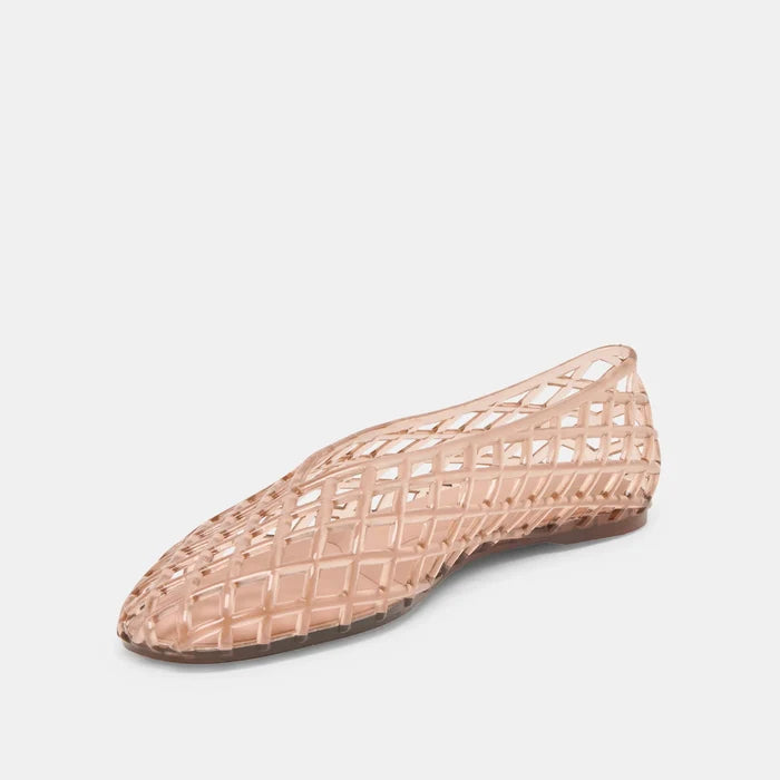 Woven pink flat shoe on a light gray background