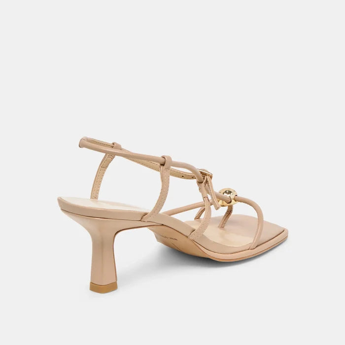 Beige high-heeled sandal on a light gray background