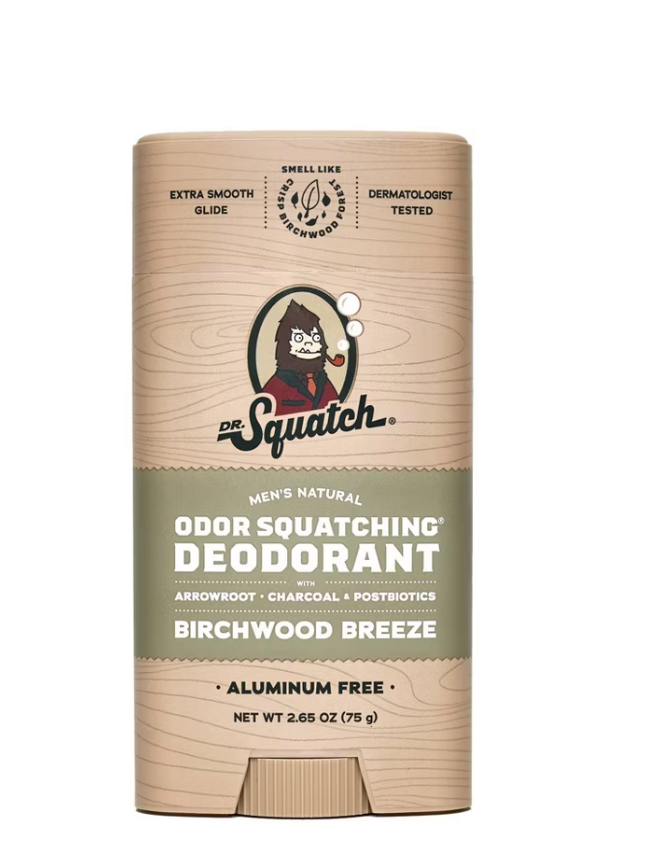 Dr. Squatch deodorant container with branding and product details on a beige background