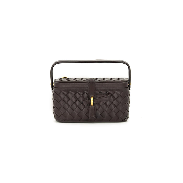 A dark brown woven leather handbag with a top handle and a front strap closure, shown against a plain white background.