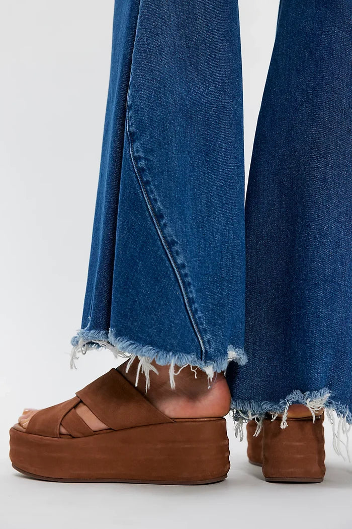 standing with brown platform shoes on