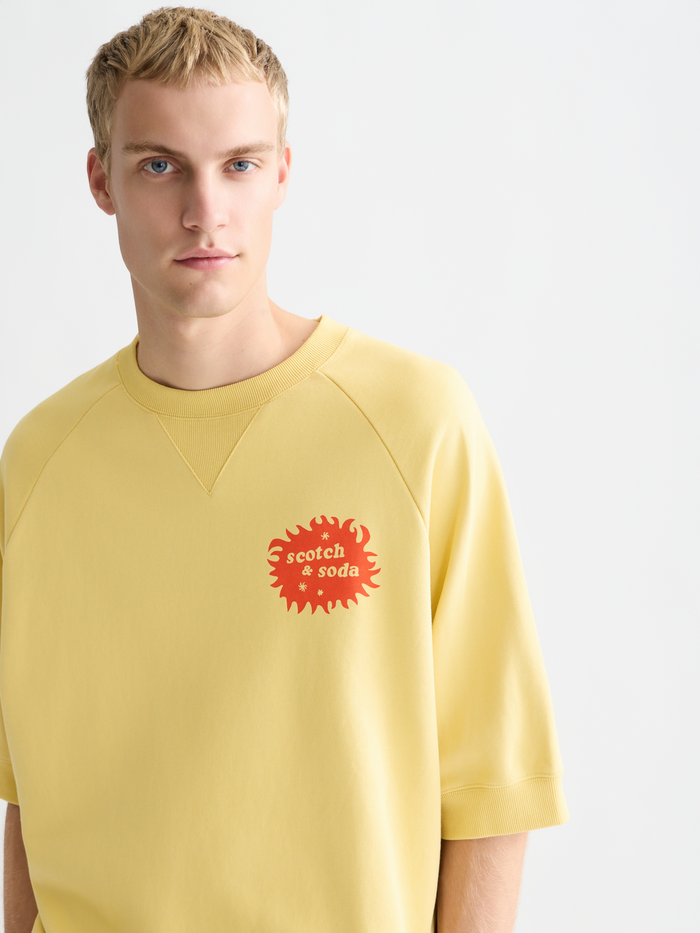 Front And Back Artwork Loose-Fit Short Sleeve Sweatshirt