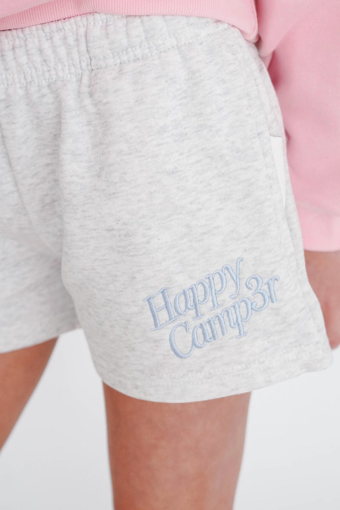 Gray shorts with 'Happy Campsr' text on a white background