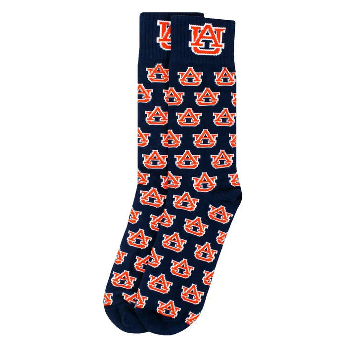 A single navy blue crew sock with an all-over repeating pattern of the Auburn Tigers logo, featuring a white and orange 'UA' logo on the cuff.