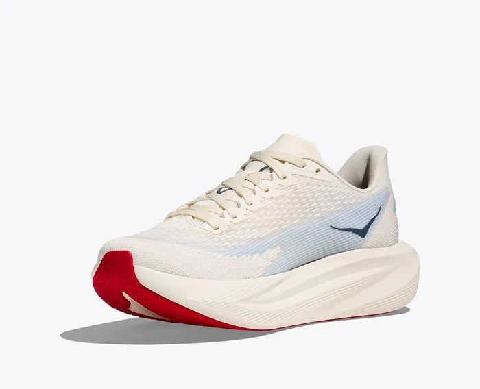 White running shoe with red sole on a white background