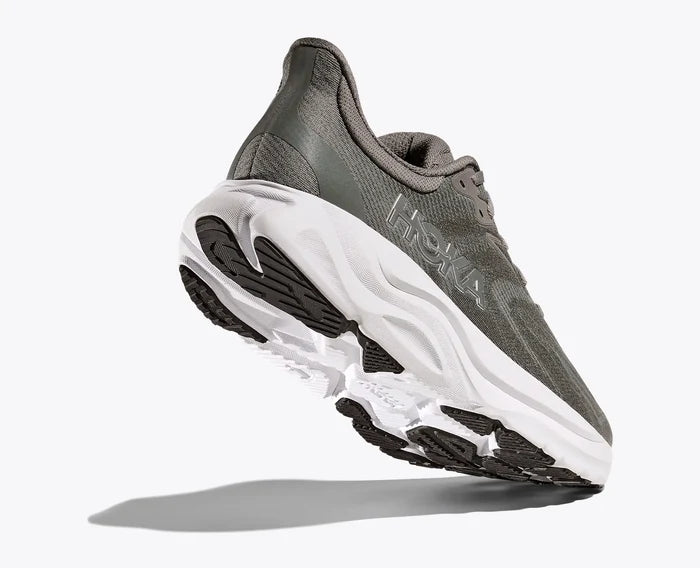 Gray running shoe with white sole on a light gray background