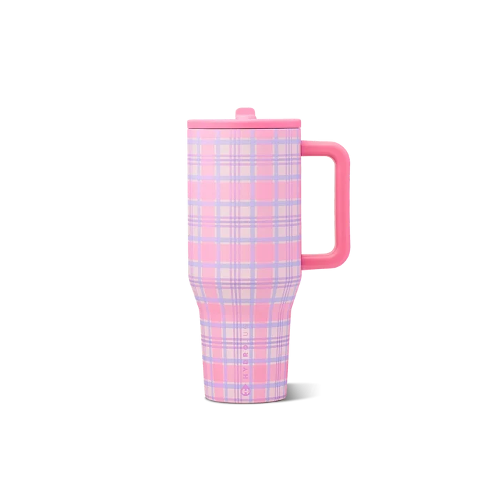 A pink and lavender plaid insulated travel tumbler with a matching pink lid and handle, shown on a clean white background.