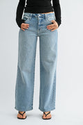 Woman modeling light wash straight leg denim jeans