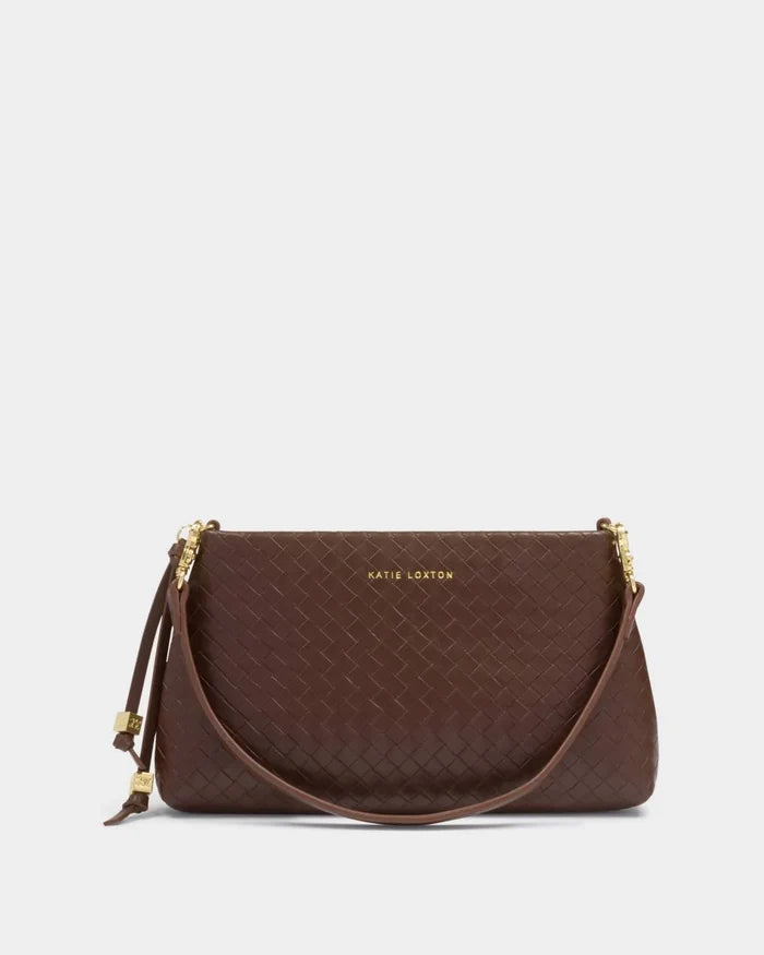 Brown handbag with a strap on a light gray background