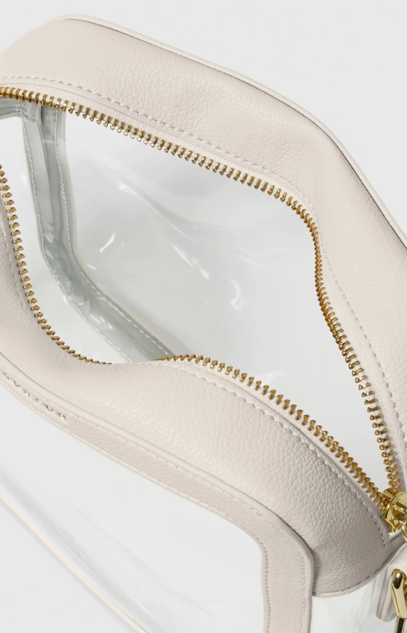 Beige pouch with gold zipper on a white background