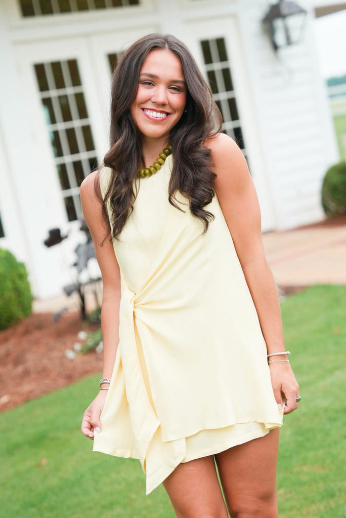 girl wearing a yellow dress