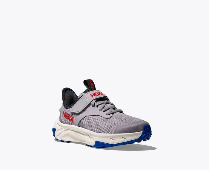 Gray athletic shoe with red and blue accents on a white background