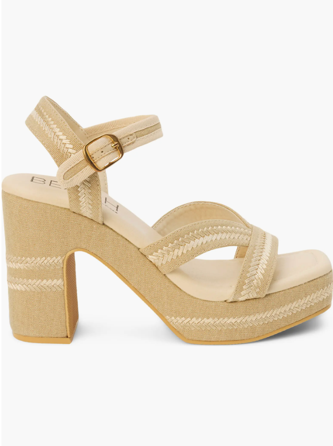 Beige sandal with block heel and woven details on a white background