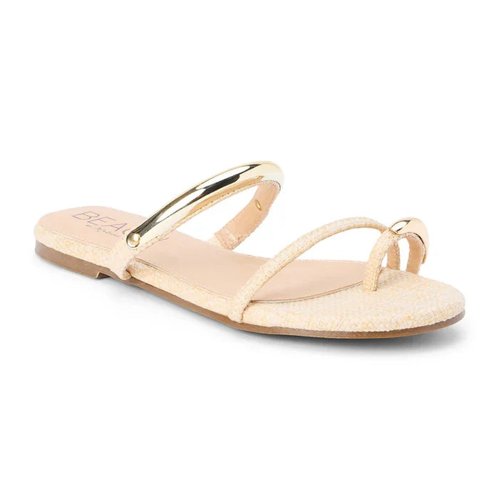 Beige sandal with gold straps on a white background