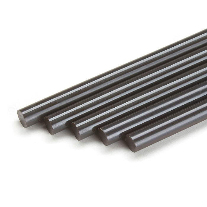 Cola-colored Knottec 7713 hot melt glue sticks presented for wood filling tasks using Power Adhesives polyamide adhesive.