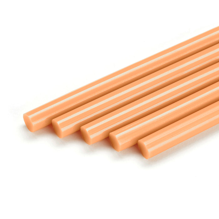 A row of beige wood repair hot melt sticks shows the uniform shape and finish of Power Adhesives Knottec 7713 filler material.