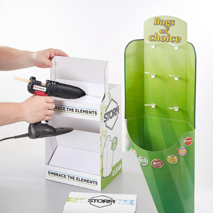 A controlled bead of hot melt adhesive dispensed onto packaging material with the Tec 830 applicator