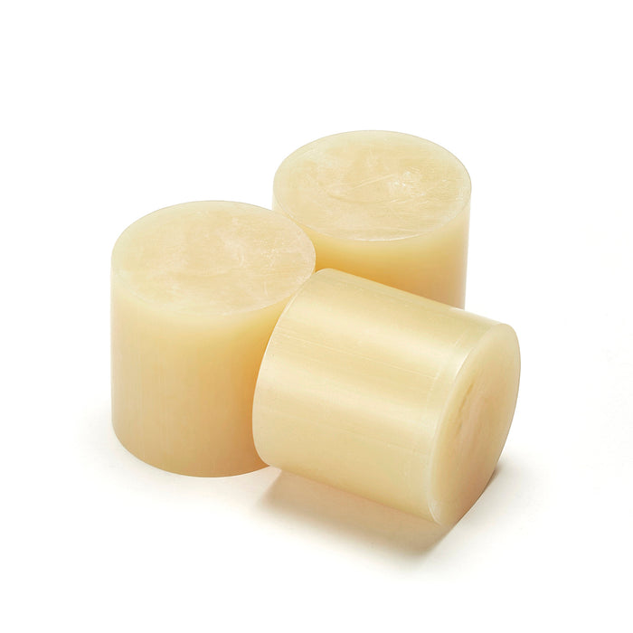 Tecbond 265 series 43mm glue slugs shown in amber for packaging and assembly.