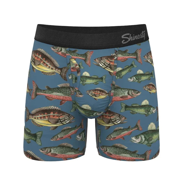 Boxer briefs with fish pattern on a blue background, brand 'Shiny' visible.