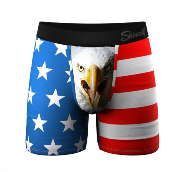 Boxer briefs with American flag design and eagle face, brand 'Shiny' visible.