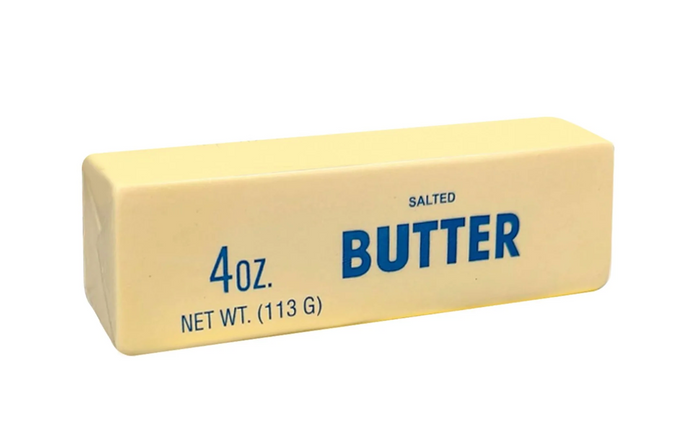 A 4 oz stick of salted butter in its original pale yellow wrapper, featuring blue text on a white background.