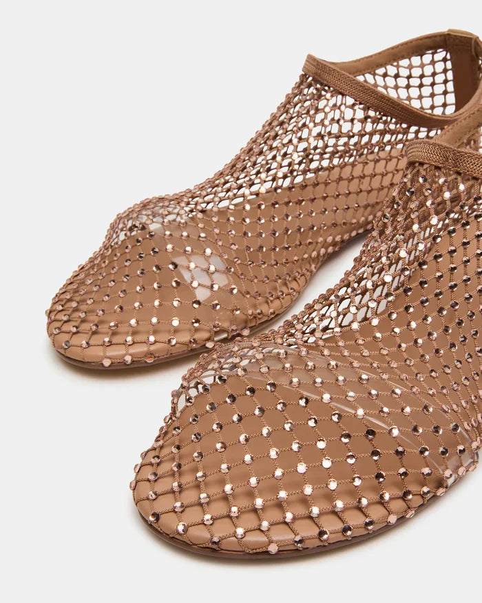 Brown mesh shoes on a light gray background