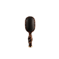 Hairbrush with tortoiseshell handle on a white background