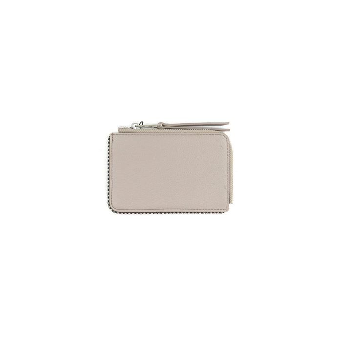 A light beige leather zip-around wallet with silver-tone metal studs along the edges and a matching leather zipper pull, shown on a plain white background.