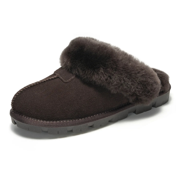 A dark brown slip-on mule slipper featuring a soft, fluffy faux-fur collar and a thick, textured black sole, shown against a plain white background.