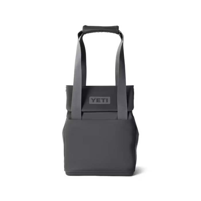 Dark gray YETI cooler with handles on a white background