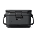A dark gray YETI cooler with black handles and a black lid, shown from a front-facing perspective on a clean white background.